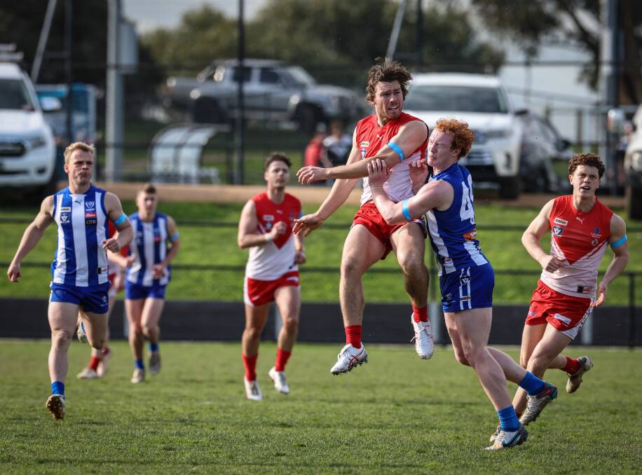 South Warrnambool's Liam Youl and Hamilton Kangaroos' Deacon White collide. Picture by Sean McKenna 