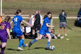 Warrnambool Rangers' Catriona Tait guides the ball down the pitch. Picture by Anthony Brady 