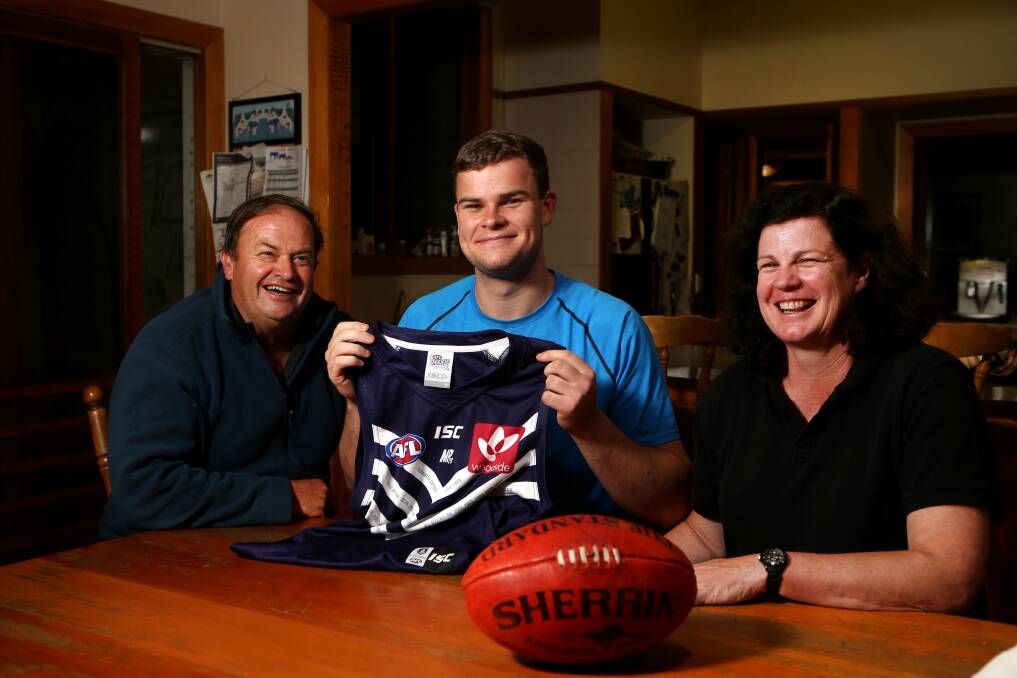 Cobden's Sean Darcy celebrates with parents Greg Darcy and Ann-Maree Sullivan at their house in South Purrumbete being drafted by Fremantle at pick 38 in 2016. File picture