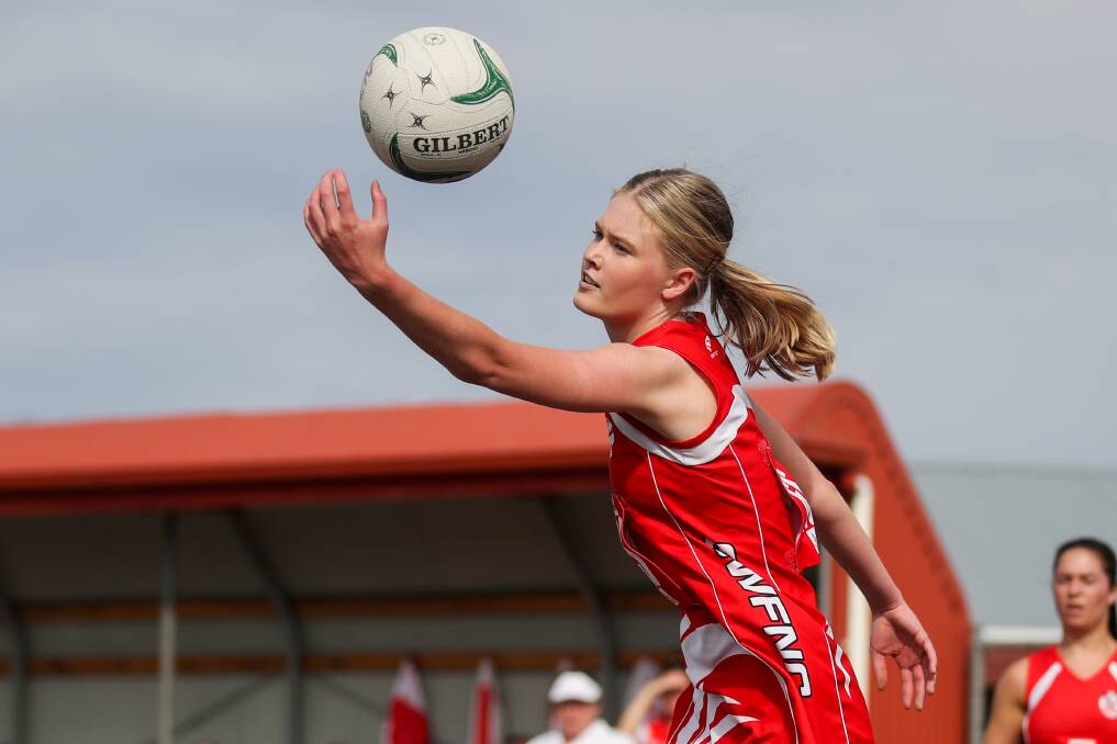 WITHIN REACH: South Warrnambool's Hollie Phillips gathers the ball during the Roosters' convincing win against Koroit on Good Friday. Picture: Morgan Hancock 