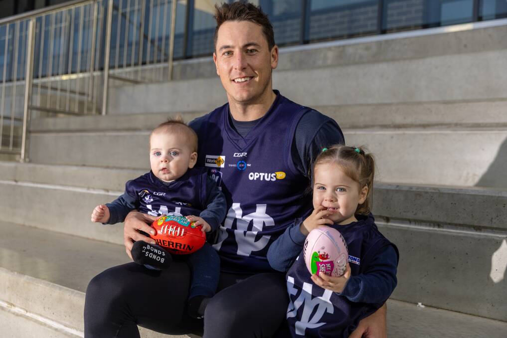 Sam Cowling with children Cooper, eight months, and Matilda, 2, ahead of his 200th senior game for Warrnambool. Picture by Eddie Guerrero 