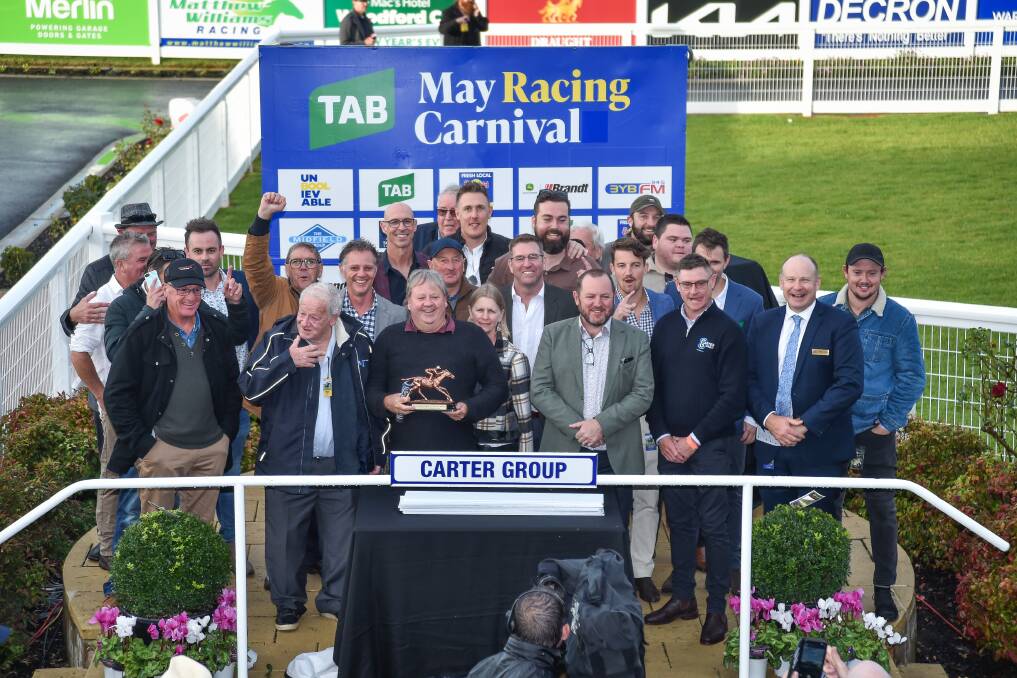 Summit Queen's connections, including former NBA assistant coach Trevor Gleeson (middle, white shirt) at the 2023 Warrnambool May Racing Carnival. Picture by Reg Ryan/Racing Photos 