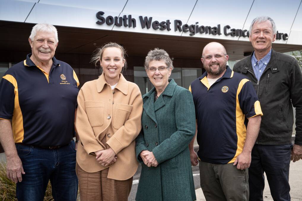 Nurse Sophie Gunning, second from left, has received a $12,000 scholarship with Rotary's Bob McMillan, Peter's Project director Vicki Jellie, Rotary's James Mepham and Vedmore Foundation's John Sambell there to make the presentation. Picture by Sean McKenna