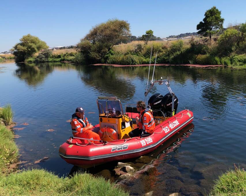 SES crews search the Merri River near the weir at the end of Bromfield Street for a missing Warrnambool man.