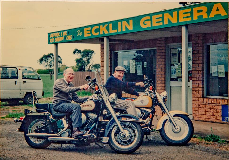 Bill and John McKinnon at the front of the Ecklin General Store which they operated for more than 50 years.