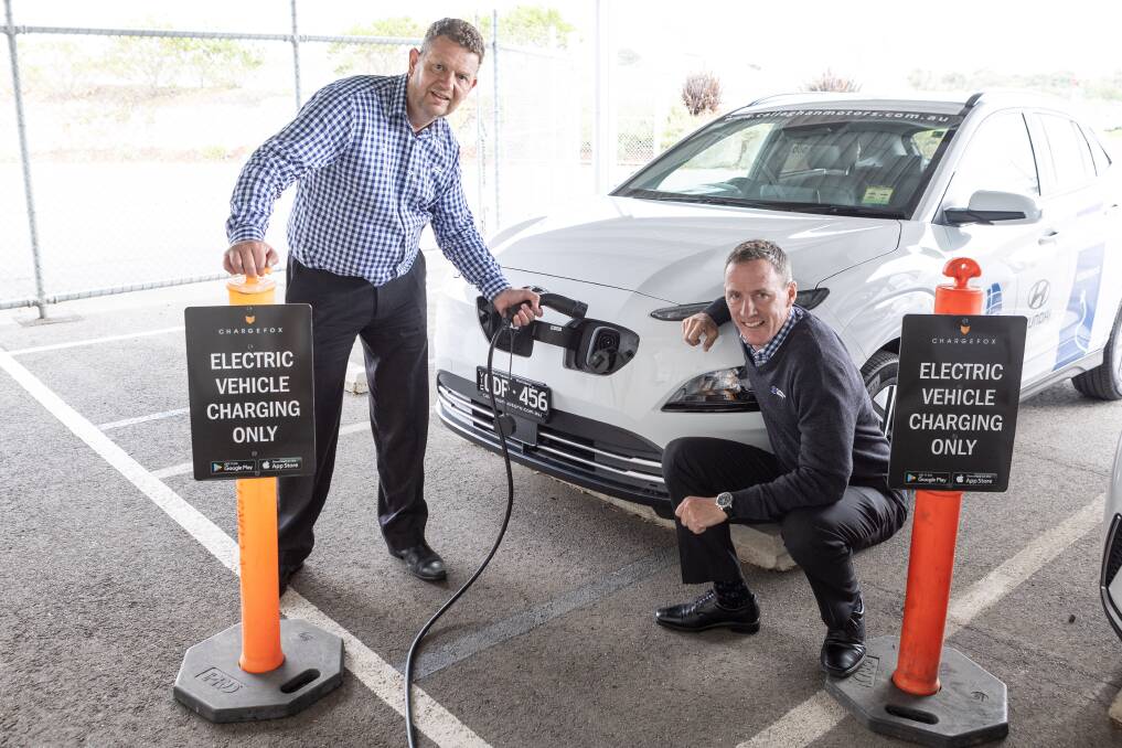 Steve Callaghan and Shane Hicks with the new public electric car charging points at the Warrnambool dealership. Picture: Anthony Brady 