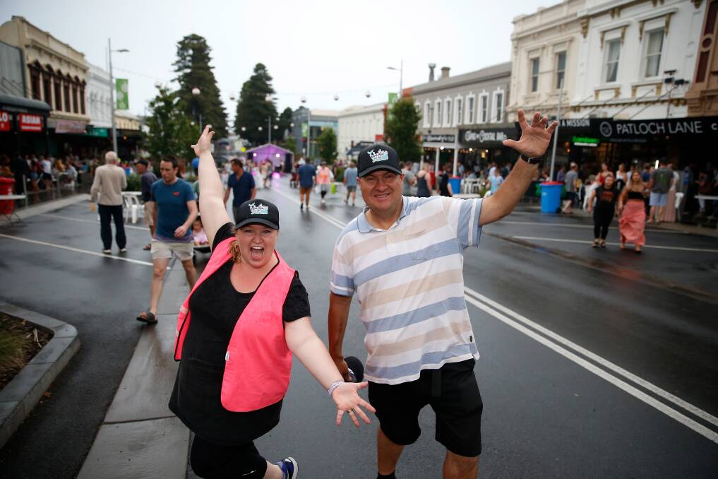 Donna Gladman and volunteer Andrew Taylor were in a party mood at the 2020 Wunta Fiesta in Liebig Street.
