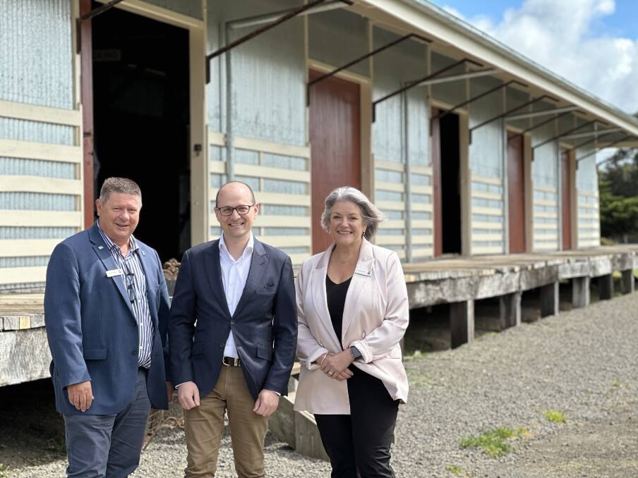 Cr Damian Gleeson, Senator Raff Ciccone and mayor Karen Foster officially open the restored railway goods shed in Port Fairy. Picture by Katrina Lovell