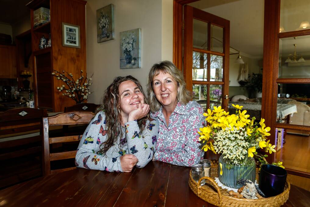 Susan Blake with daughter Emily who was injured in a school bus crash in 2009. Mrs Blake is continuing her campaign for safety changes on buses. Picture file