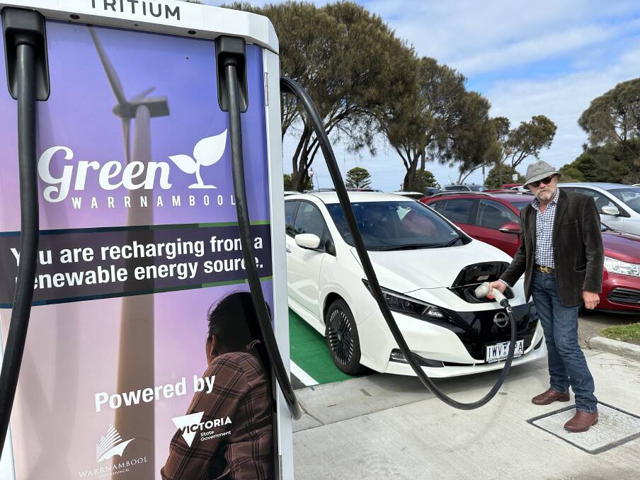 Cr Richard Ziegeler with one of council's new electric vehicles at the newly installed charging station at Flagstaff Hill Maritime Village. 