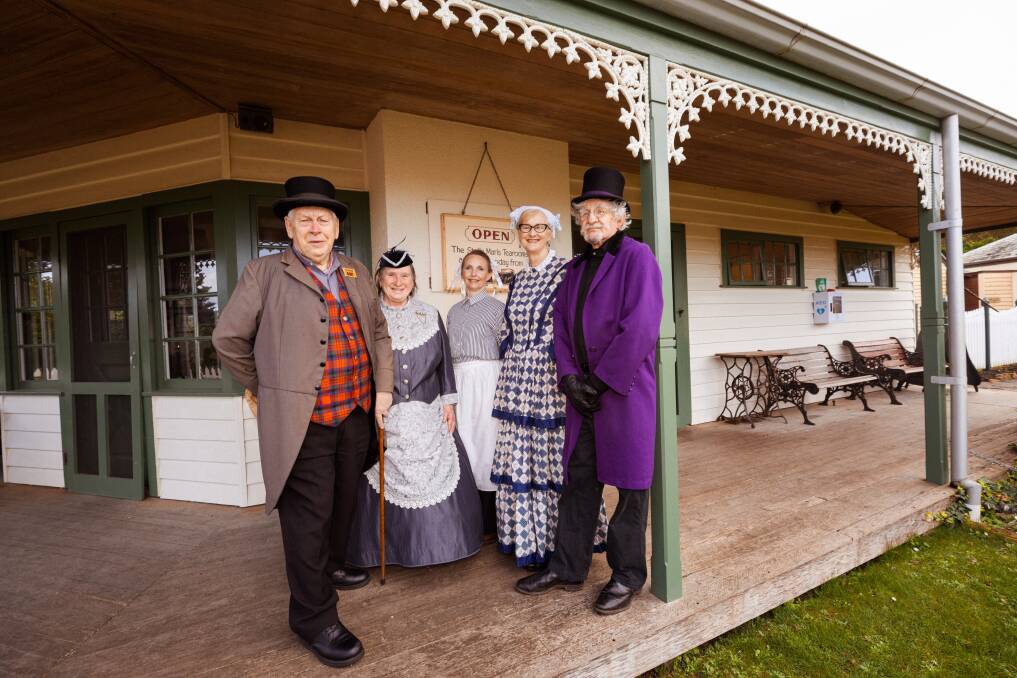 Barry Dodson, Glenda Peterson, Amee Nash, Jennifer McFarlane and Dr John Harrison in period costume at Flagstaff Hill Maritime Village ahead of their high tea this weekend. Picture by Sean McKenna. 