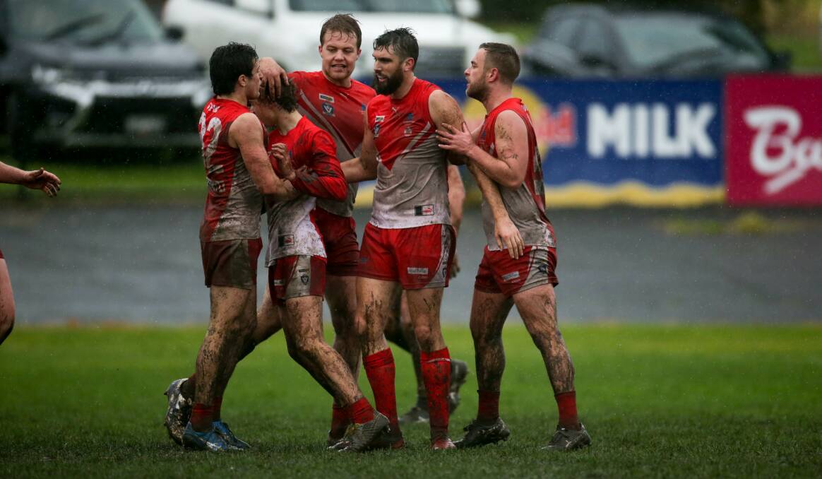 TOGETHER: South Warrnambool players congratulate Will White on a goal. Picture: Chris Doheny