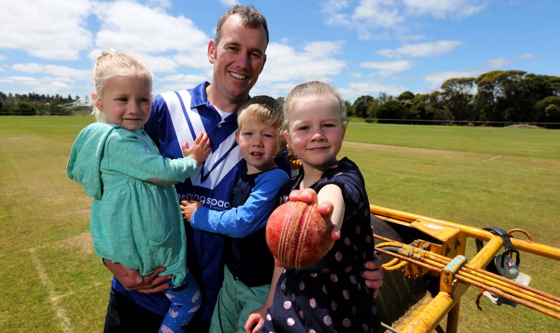 FAMILY AFFAIR: Nathan Divall pictured with children Ruby, 3, Oscar, 3, and Isabel, 5, at Jetty Flat. He will play his 300th game against West Warrnambool on Saturday. Picture: Rob Gunstone