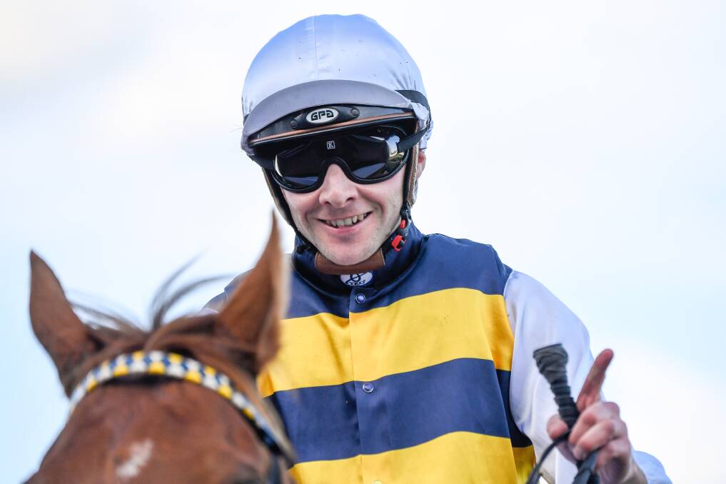 WINNER'S SMILE: Declan Bates returns to the mounting yard on Haky after winning the William Newton VC Handicap at Flemington on Saturday. Picture: Reg Ryan/Racing Photos