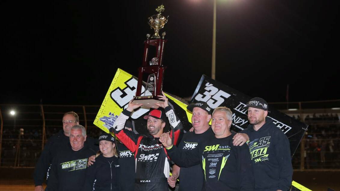 TEAM EFFORT: Warrnambool driver Jamie Veal celebrates his breakthrough Classic victory with his support crew. Picture: Rob Gunstone