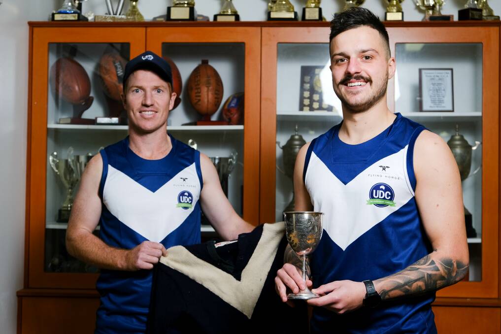 HERITAGE: Paddy Mahony and captain Louis Kew unveil Panmure's heritage jumper they will wear against Allansford in July. Picture: Chris Doheny