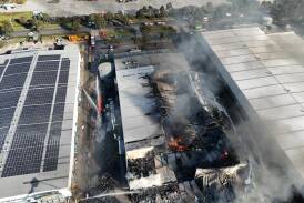 A collapsed roof and walls has made it hard for fire crews to extinguish the chemical factory blaze. (HANDOUT/VICTORIA ENVIRONMENT PROTECTION AGENCY)
