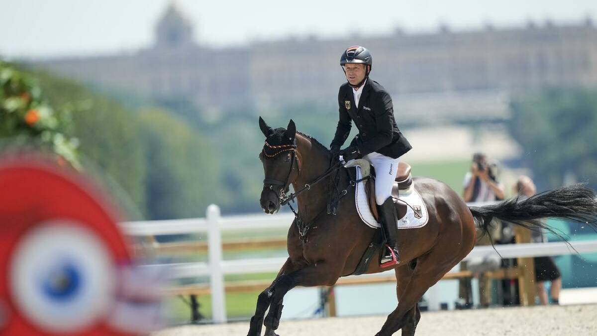 Michael Jung, on Chipmunk FRH, jumps to his third individual eventing victory. (AP PHOTO)