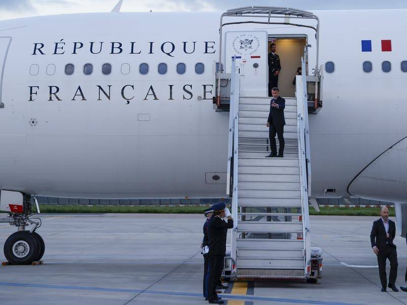 Emmanuel Macron will be accompanied by ministers for Thursday's talks in New Caledonia. (AP PHOTO)