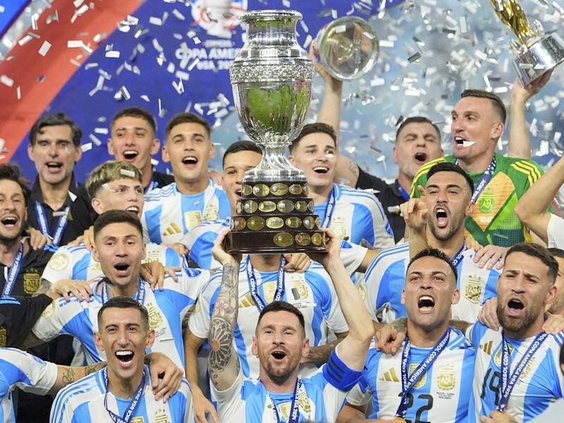 Despite going off injured, Lionel Messi's Argentina side won a record 16th Copa title. (AP PHOTO)