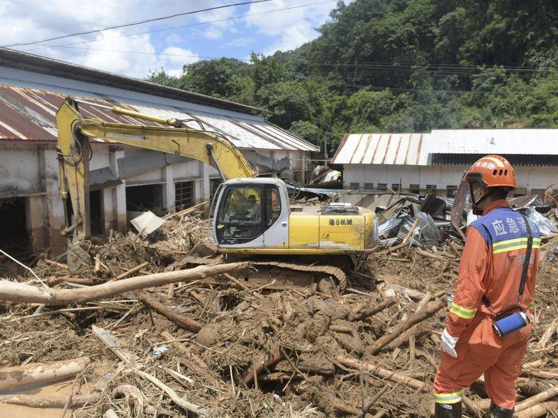 Landslides, floods and mudslides have severely damaged towns in Pingyuan County, Guangdong. (AP PHOTO)