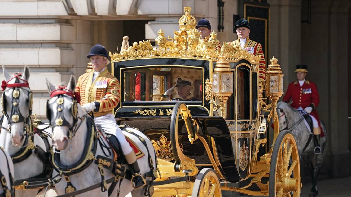 King Charles and Queen Camilla arrived by horse-drawn carriage from Buckingham Palace. (AP PHOTO)