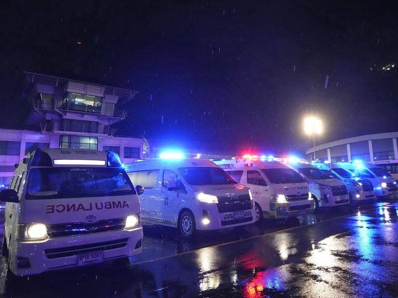 Thai ambulances were waiting on the tarmac to ferry passengers from a stricken Singapore flight. (AP PHOTO)