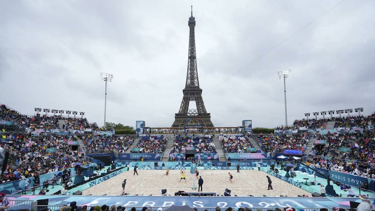 The Australian beach volleyballers believe this is the best sporting venue. (AP PHOTO)
