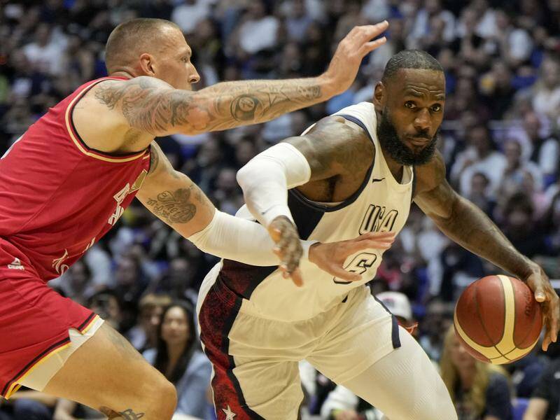 LeBron James took charge late to ensure the US overcame Germany in their final pre-Games hitout. Photo: AP PHOTO