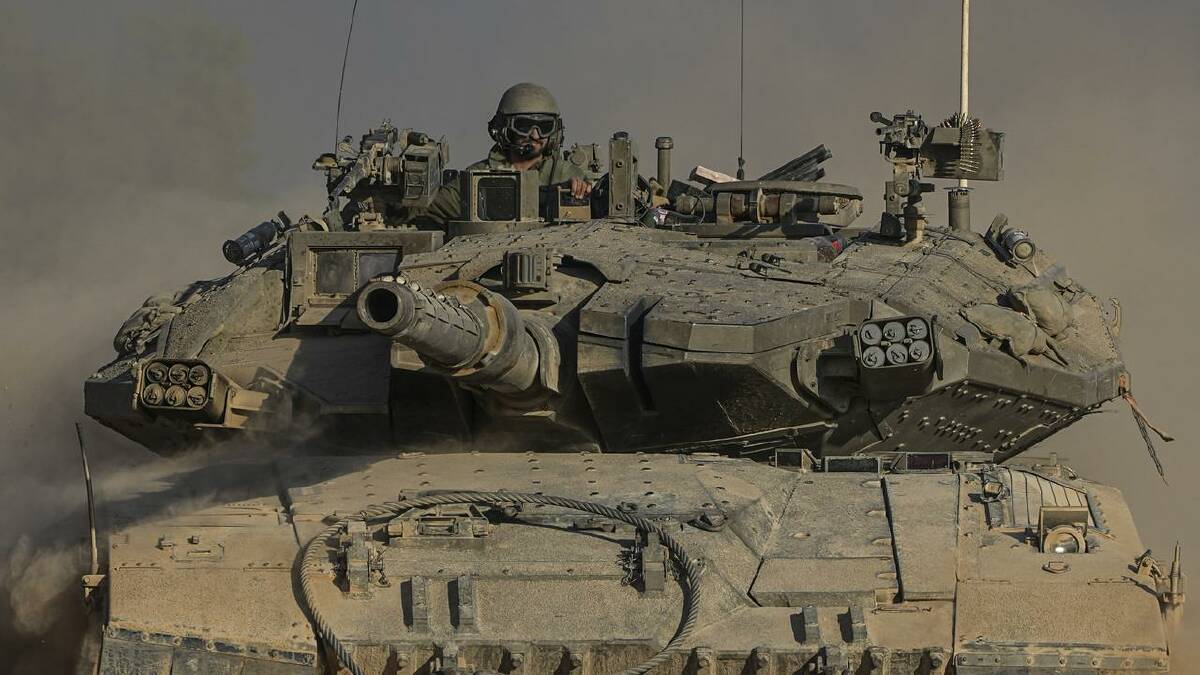 Israeli tanks carried out a raid in the north of Rafah before retreating. (AP PHOTO)