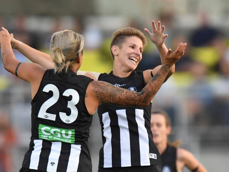 Ex-Collingwood AFLW vice-captain Emma Grant (R) says she suffered damage while playing for the club. (Mal Fairclough/AAP PHOTOS)
