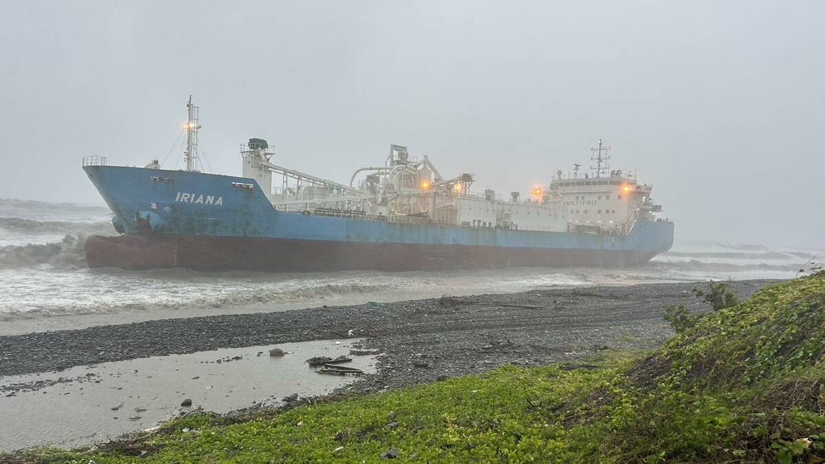 An Indonesia-flagged cement ship ran aground due to Typhoon Gaemi in southern Taiwan. (EPA PHOTO)