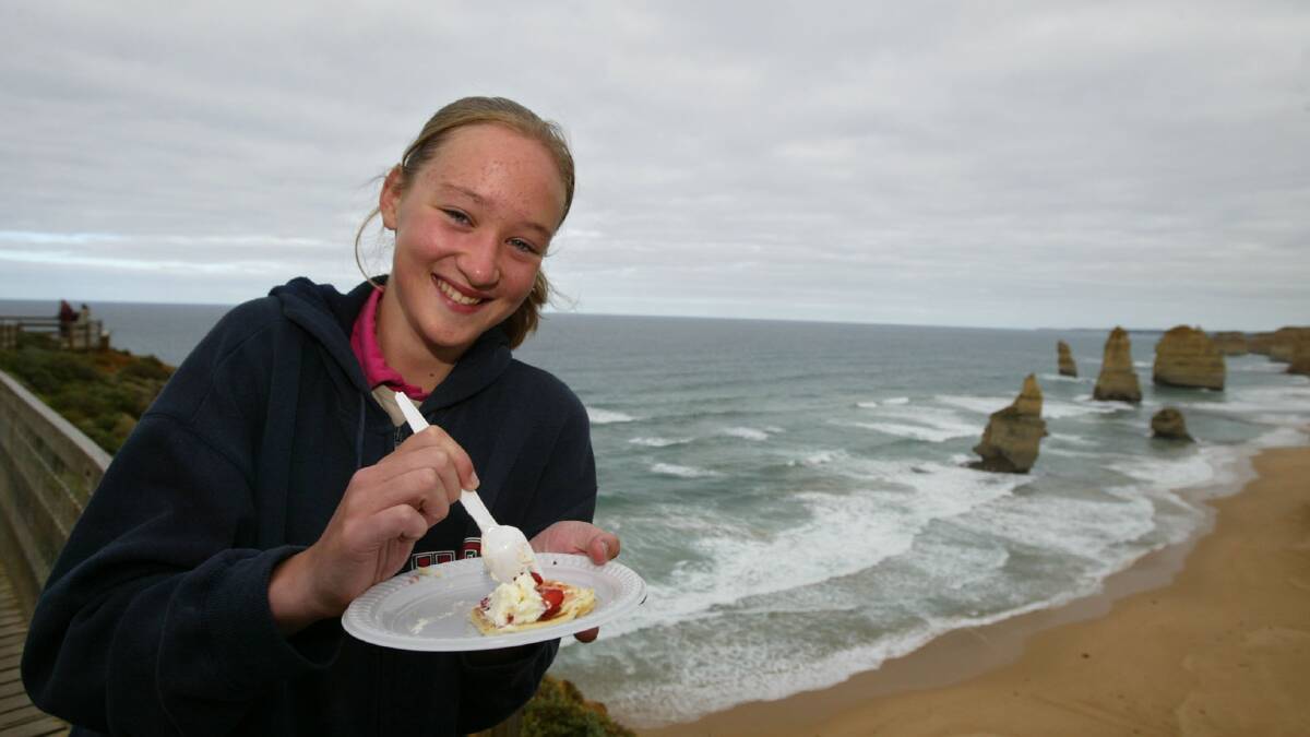 Warrnambool's Megan Pearce, 13, enjoying a pancakes with strawberries breakfast at the Twelve Apostles.