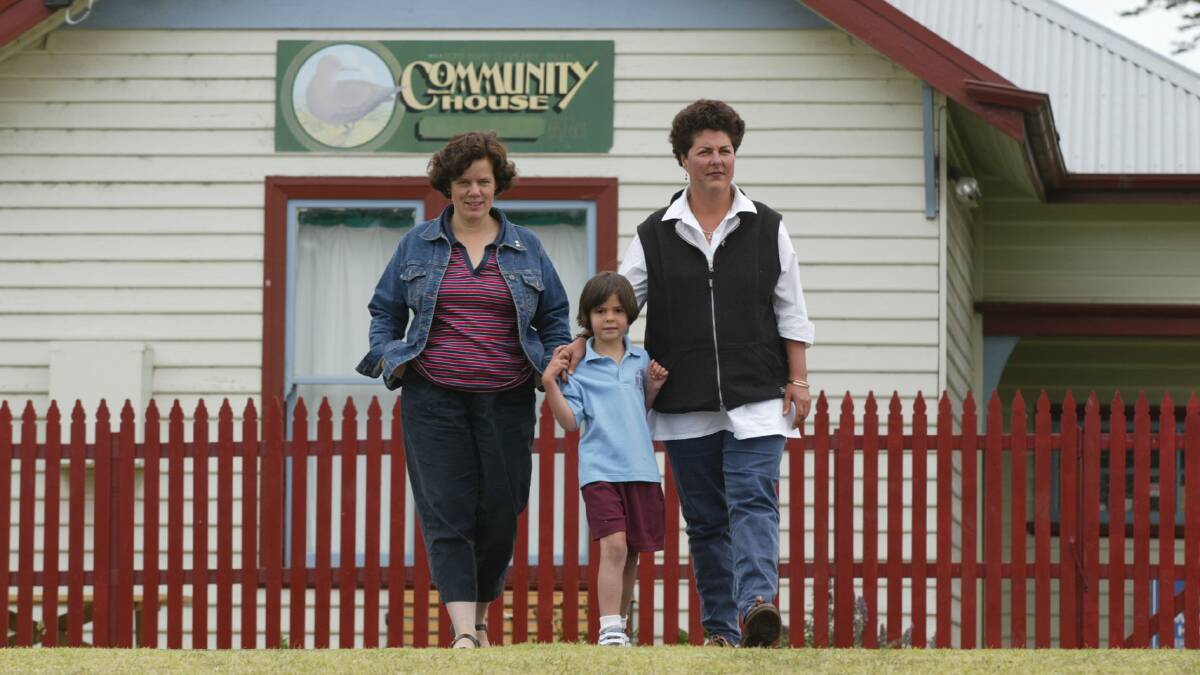 Port Fairy Community House chairperson Mary Ewen (left) with committee member Genevieve Grant and daughter Phoebe, 5.