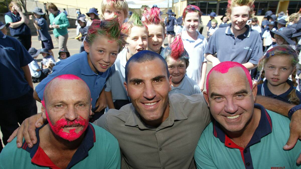 Teacher Trevor Holder, parent Jason Mifsud and school principal Alan Richardson at the  Merrivale Primary School Shave For A Cure.