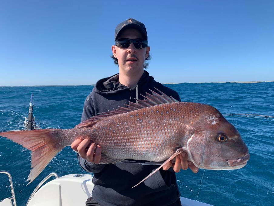 PB: Jimmy Lombardo pictured with his personal best 80cm snapper caught off Warrnambool. 