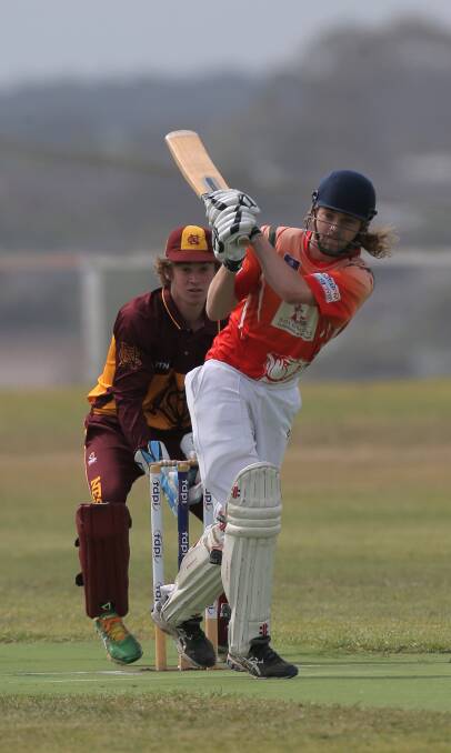 HAVING A DASH: Dennington's Xavier Beks plays an aggressive shot as Nestles wicketkeeper Cameron Williams gets ready if he misses. Picture: Vicky Hughson

