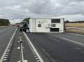 The caravan was blocking the west-bound lane of the Princes Highway near Cudgee Cars. Picture supplied