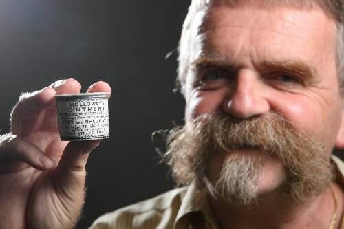 Tim Auld with the Holloway's ointment jar he found on the beach at Port Fairy. 080514GW43 Pictures: GLEN WATSON
