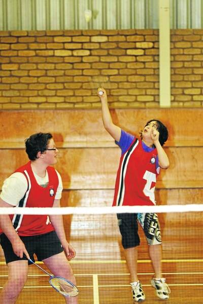 SPORT Badminton tournament. Pictured - l-r Terang College year 8 students Daniel Pugh, 14, watches as teammate Shaun Wood tries an overhead shot.  110906RG05 Picture: ROB GUNSTONE