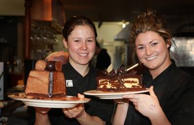Warrnambool Chocolate Week.Pictured from Images Restaurant cafe and cocktail bar -  Casey Romein holding a  chocolate mountain moussecake and  Therese Freeman holding a  chocolate cheesecake.      090930am16  PICTURE: ANGELA MILNE