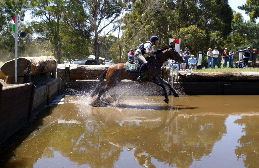 David Middleton on WGEP Figjam, jumping the water fence at the Lakes and Crater three-day event at Camperdown.