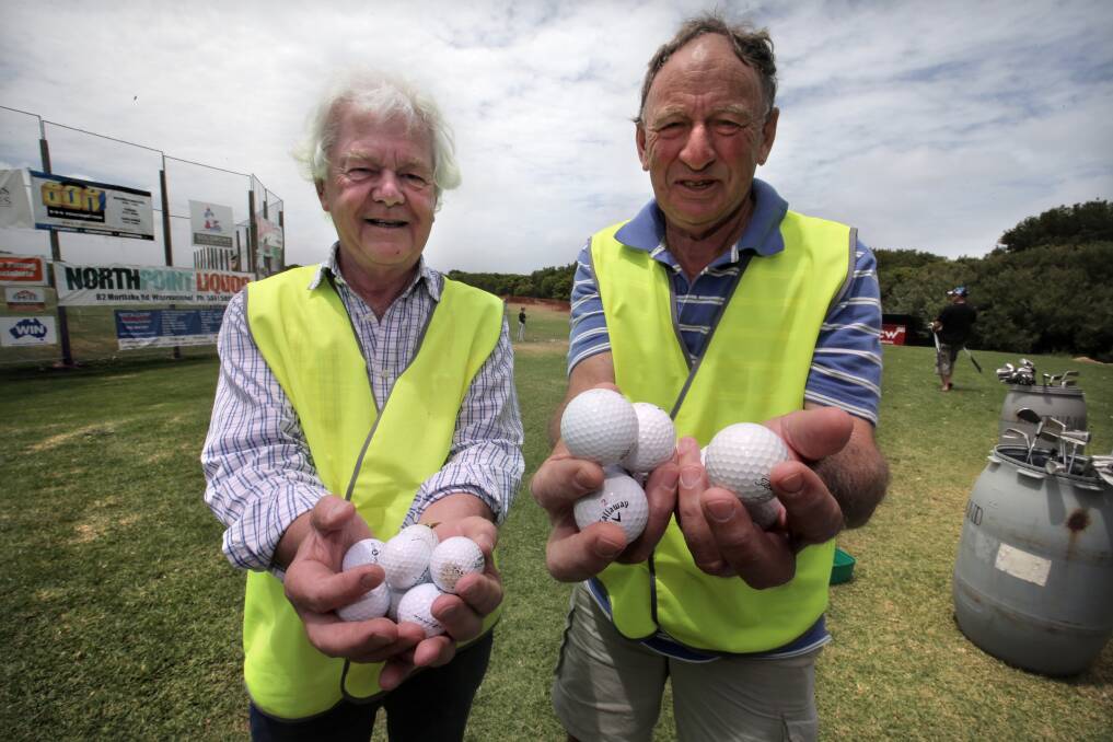 East Warrnambool Rotary Club members Rusell Isaac and Ralph Ludeman are hosting the 'Hole in One' competition. Picture: DAVE LANGLEY