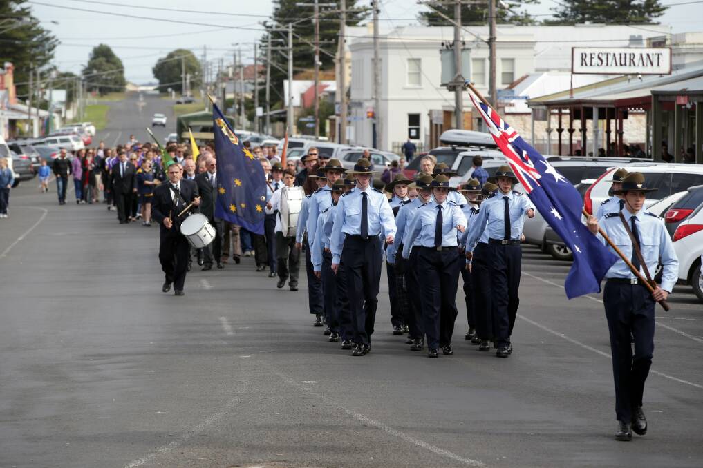 413 Squadron Australian Airforce Cadets lead parade along Bank street Port Fairy. 