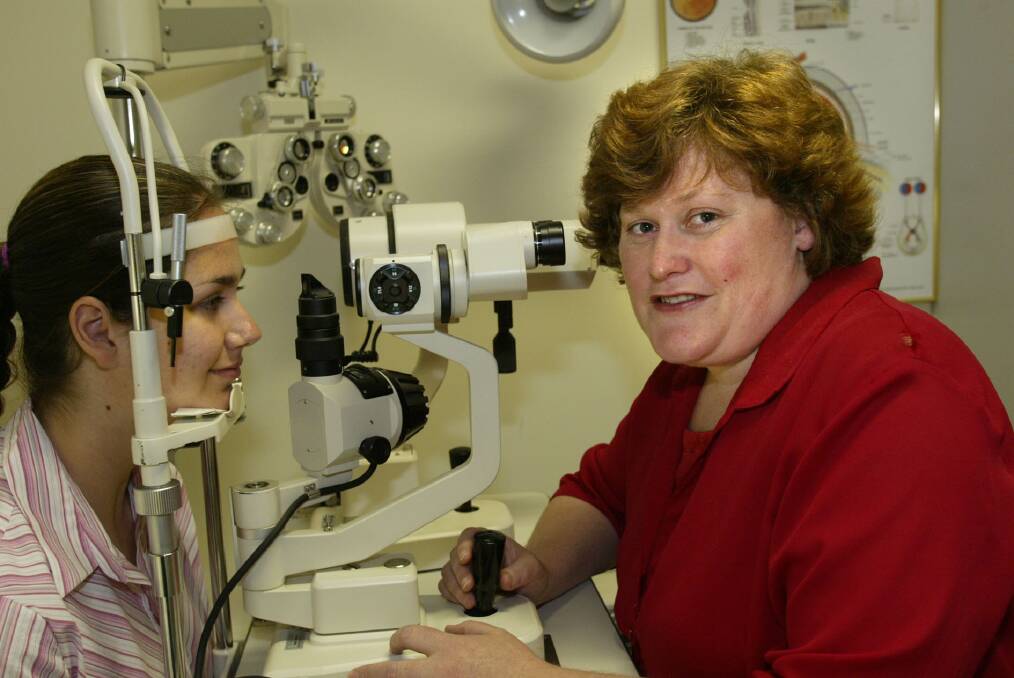 Optometrist Patti Valance at OPSM tests the eyes of Chloe Morrison, 15, from Derrinallum.