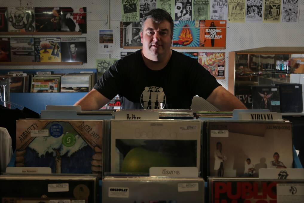 Shane Godfrey, who runs a record stall at the Independant Traders Market on Timor Street, says vinyl sales are on the rise. Picture: DAVE LANGLEY