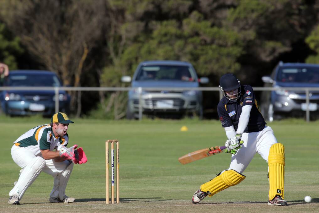 Woodford batsman Nick Butters, watched by Allansford's Rowan Ault in the final of the WDCA Twenty20 tournament. Picture: DAVE LANGLEY