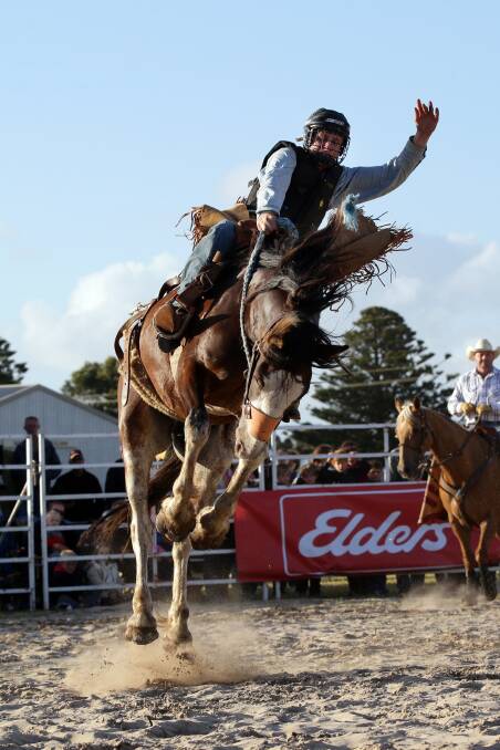 Saddle Bronc rider Beau Kerr in the Port Fairy Woodall Rodeo held at Port Fairy Show Grounds. Picture: DAMIAN WHITE
