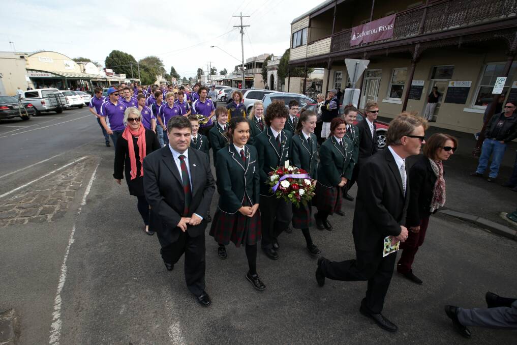 Brauer College students and Port Fairy Football Netball club parade along Bank street Port Fairy. 