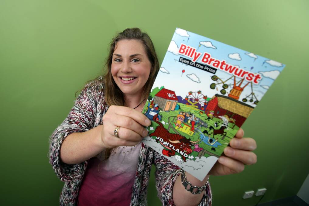 Panmure author Jo Hyland with her book Billy Bratwurst Eyes on the Prize. Picture: DAMIAN WHITE